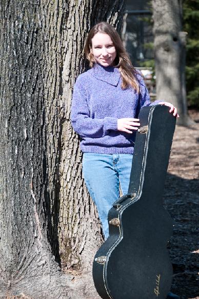 Julie Kaylin standing by tree photo